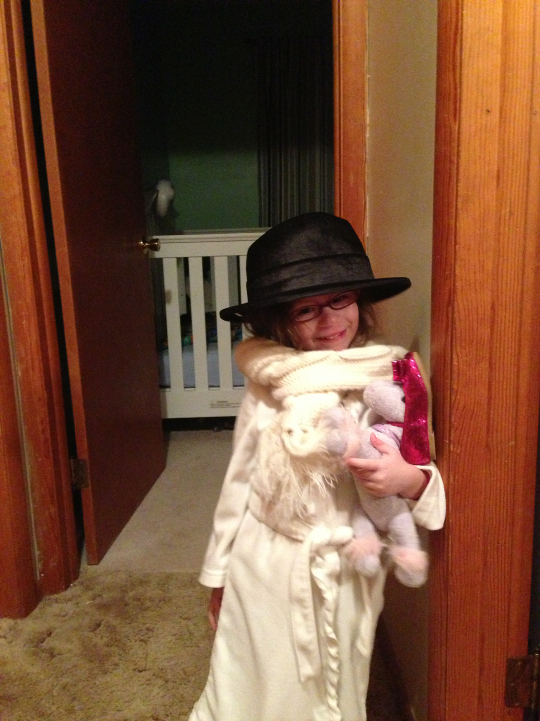 Anna playing spies. She and her stuffed purple pony are in disguise. She was the &#8220;Countess Hoffenfoff,&#8221; and the pony was&#8230;wearing a shoe on its head.