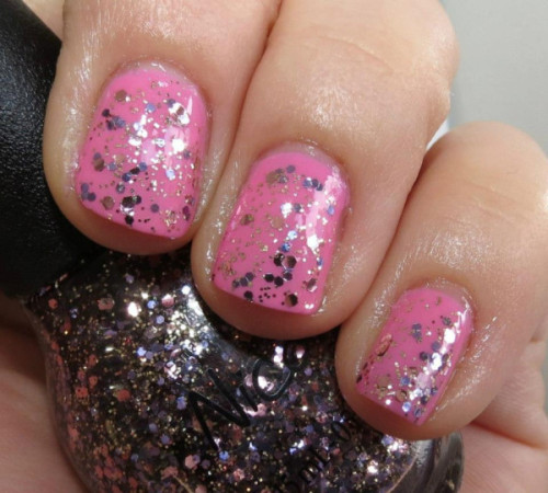
Selena Gomez&#8217; &#8220;Naturally&#8221; with &#8220;Inner Sparkle&#8221; on top, from her Nicole by OPI Nail Polish Collection! 
