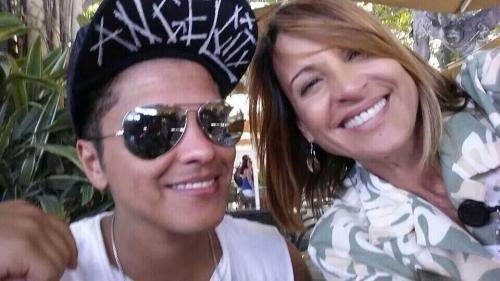 Bruno with a fan in Hawaii (found here)