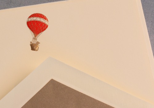 From the Flights of Fancy collection, introducing our Hot Air Balloon, two-pass engraved in red and gold.