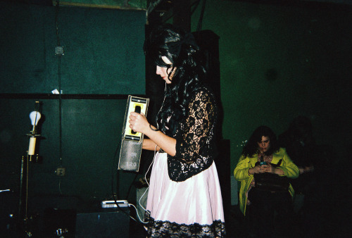 Woman Texting During Nummy Performance