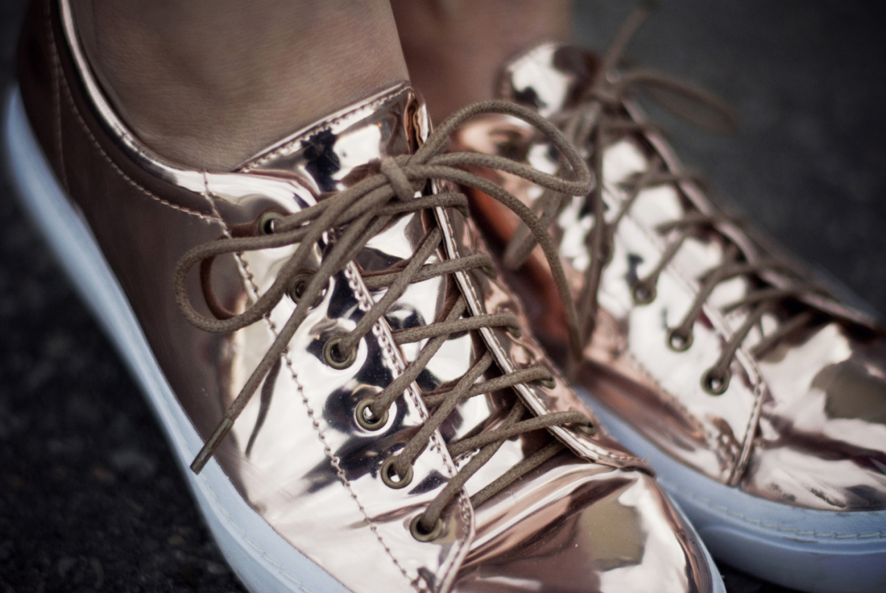 music to my ears

did a collaboration with ENVIshoes all about these lovely metallic sneakers a.k.a. the JC flavia - check out the blog post here plus read my interview!
by the way, i do actually play the guitar, not very well by an means, but i did teach myself so i will use that as an excuse. i like singing and strumming along when i&#8217;m feeling emotional. maybe one day you&#8217;ll see :) orrrrr more likely you won&#8217;t, cause i&#8217;m shy like that.
wearing: JC flavia sneakers via ENVIshoes // american apparel red blouse // zara skort // tevin vincent bracelets // urban outfitters watch, hat, and sunnies // nic&amp;mel iphone case // vintage necklace
photos by the awesome marcel @ onedapperstreet.com
