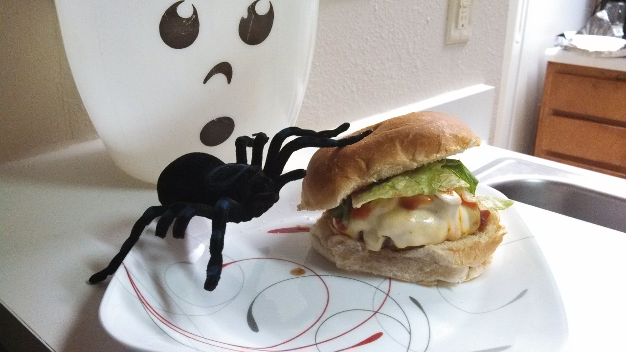 I&#8217;ve Created a Meunster with meunster cheese.Well, I mean it was Halloween last week.  This lean patty is topped with sauteed mushrooms smothered in creamy meunster cheese.  A tad of ketchup and a bit of lettuce for some color.  May or may not come with spider.I bought some lean beef, it was on sale. I normally don&#8217;t like making burgers with anything more than 85% lean since it&#8217;s hard to keep in a patty, but I went for it.  I cooked the burger medium well, and put a thick slice of meunster on it, then the mushrooms (sauteed in butter - nothing fancy) and another slice of meunster. It looked far too.. tan and unappealing. So i added a tiny bit of ketchup and some lettuce for color.The burger came out pretty well. It wasn&#8217;t anything gourmet, but it was tasty.  The mushrooms really added, but the meunster was just too delicate of a flavor to really stand out.  Should I have used more? Who knows.  Either way, I&#8217;d eat it again.