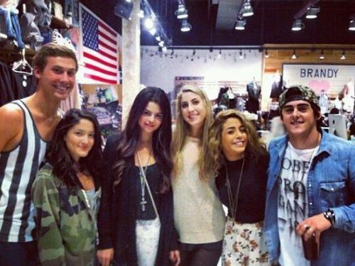 Another picture of Selena at the mall today with fans!