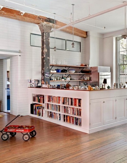 built-in bookshelves in the kitchen (via *nicety)
