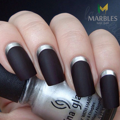 Black matte nail art with silver linings Latest trends for...