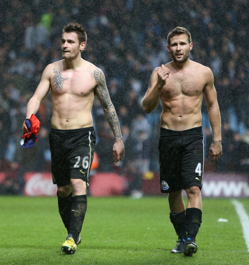 FOOT - PREMIER LEAGUE - 2013  29th January 2013 - Barclays Premier League - Aston Villa vs. Newcastle United - Mathieu Debuchy of Newcastle (L) and Yohan Cabaye of Newcastle walk off topless after the match - Photo: Simon Stacpoole / Offside. *** Local Caption ***    