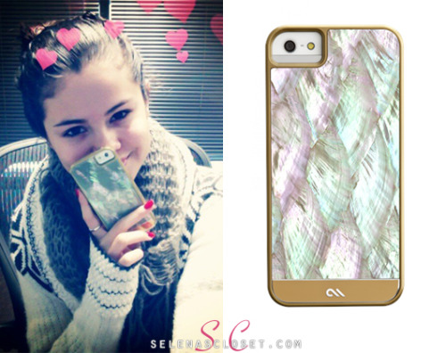 Selena Gomez tweeted out a cute Valentine&#8217;s Day themed picture of herself showing off her new Case-Mate Gold Pearl iPhone 5 Case. This case is more expensive than her previous cases, costing a pricey $150.00. <br /> Buy it HERE <br /> She&#8217;s also wearing an Ecote cardigan and Urban Outfitters scarf. <br /> Happy Valentine&#8217;s Day!!!