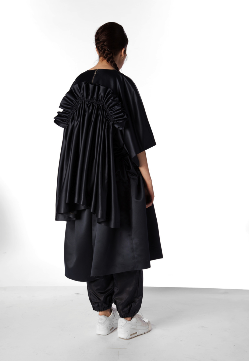 Fresh new talent from Central Saint Martins, MA graduate Caitlin Price takes the sports luxe trend to new levels with her androgynous street wear collection.