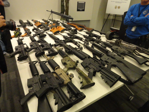 Police display seized assault weapons