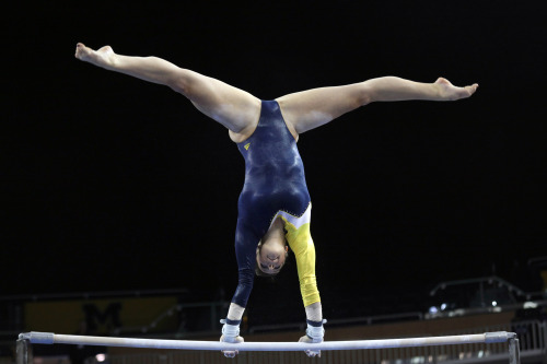 In a meet against Central Michigan University on December 8, 2013. Michigan won 196.550-193.100. 