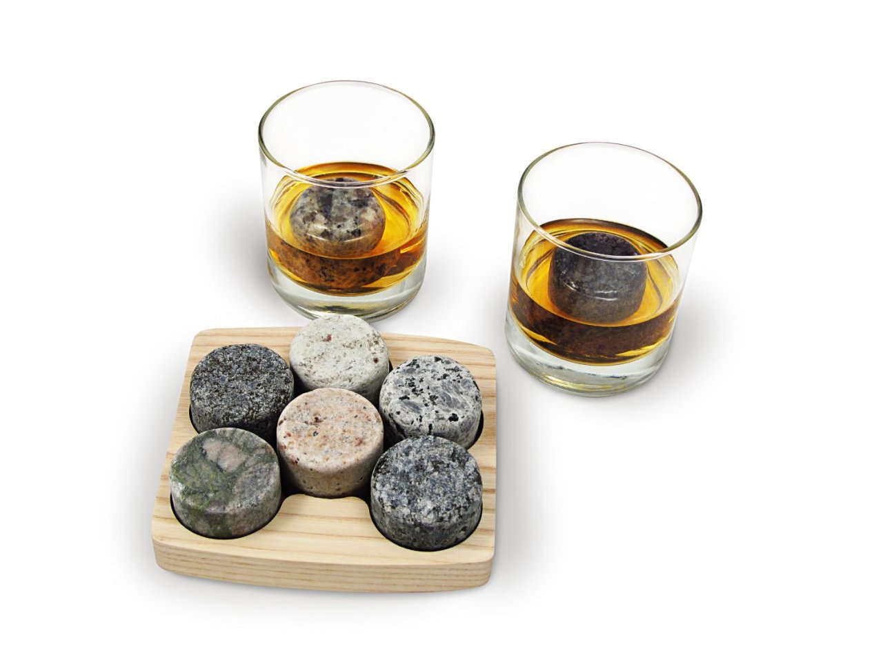 Sea Stones On The Rocks
On The Rocks chills whiskies and other fine liquors to their ideal drinking temperature (about 59-Degree F) without adding unwanted taste or diluting the drink. The solid granite stays cold, ensuring a smooth and leisurely drinking experience. Ice cubes can also change the taste and odor of a drink as they melt and dilute the spirit.