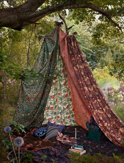 
a fabric tent in the woods via x.
