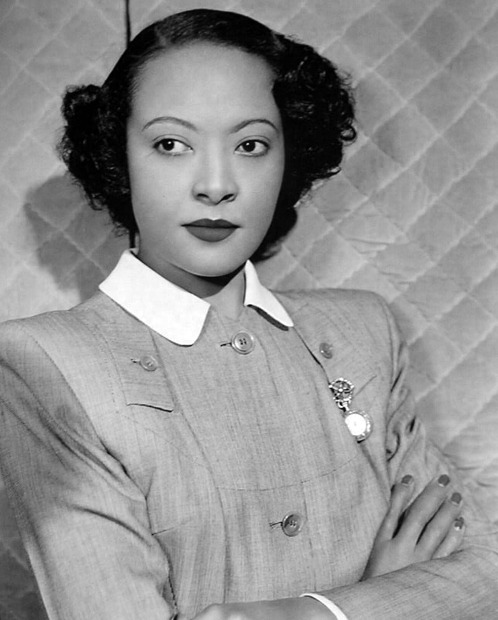 Actress Theresa Harris as she appeared in the 1948 film, &#8220;The Velvet Touch,&#8221; which starred Rosalind Russell. Ms. Harris was the inspiration behind Lynn Nottage’s play, &#8220;By the Way, Meet Vera Stark&#8221; which starred Sanaa Lathan. From Donald Bogle’s Bright Boulevards, Bold Dreams: The Story of Black Hollywood: &#8220;Harris - who was both outspoken and highly intelligent - didn’t mince words about the plight of colored actresses. She told Fay M. Jackson, of the California Eagle in August 1937: “I never felt the chance to rise above the role of maid in Hollywood movies. My color was against me. The fact that I was not ‘hot’ stamped me as either an uppity ‘Negress’ or relegated me to the eternal role of stooge or servant. I can sing but so can hundreds of other girls. My ambitions are to be an actress. Hollywood had no parts for me.&#8221; Photo via A Certain Cinema.