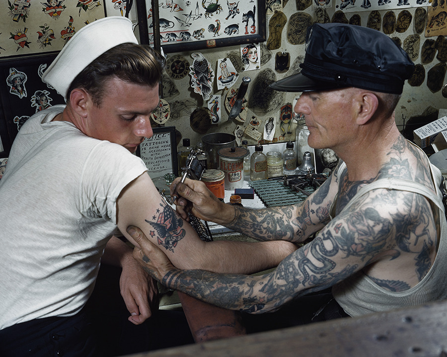 A sailor gets a tattoo on his arm in Virginia.Photograph by Paul L. Pryor, National Geographic