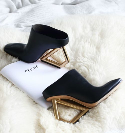 obsessed with these shoes by Celine. black and gold glamour.