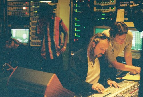Bryan Carlstrom (foreground), who engineered Alice in Chains’ Dirt, has passed away. The above picture, featuring guitarist Jerry Cantrell, bassist Mike Inez, Carlstrom and producer Dave Jerden, presumably was taken during Alice in Chains’ Music Bank sessions in 1998. (H/T David de Sola)
