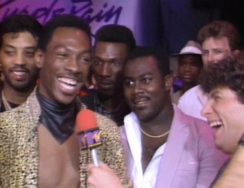 eddie murphy, CHARLIE MURPHY, and luther vandross at the Purple Rain premiere.