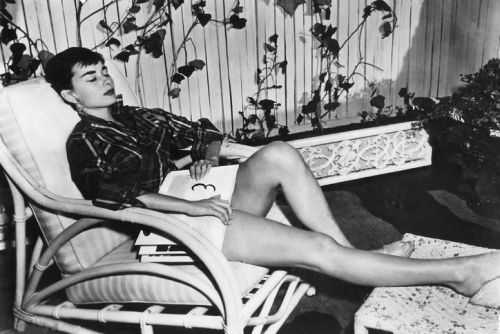 Vintage Photo Friday: This is exactly how we plan on spending our weekend too, Audrey. 