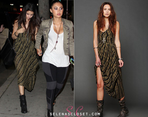 Selena Gomez was spotted entering a restaurant with her friend Francia Raisa last night wearing this Free People New Romantics Waikiki Wrap Dress. You can find it on Free People&#8217;s website for $128.  <br /> Buy it HERE <br /> She&#8217;s also wearing Fergie Footwear boots and carrying a Dolce &amp; Gabbana bag