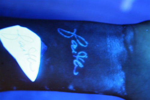 UV Blacklight Tattoo“Faith” handwritten by her mother.