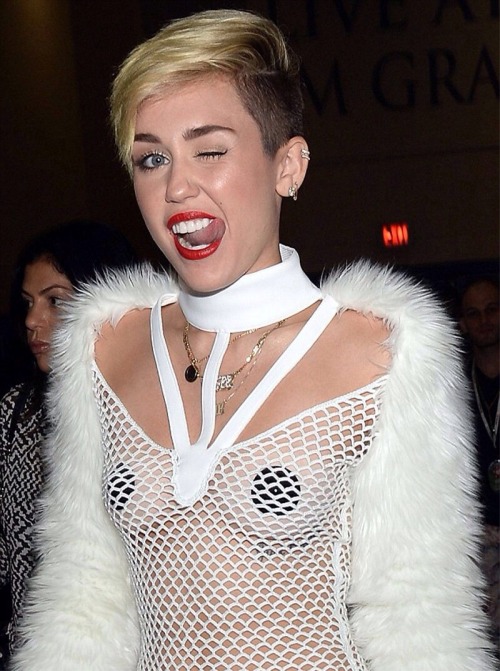 Miley Cyrus is Braless in fishnet dress revealing pasties&#8230;I think she called Lady Gaga about this fashion statement&#8230;I mean who else wears ish like this&#8230;#1