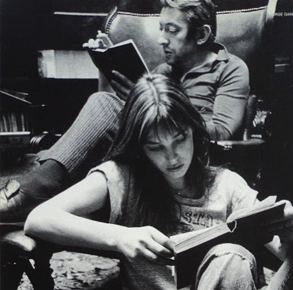 The duo read.
thelibrarianbookclub:

Jane + Serge = book lovers.
