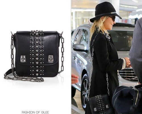 Dianna Agron leaves LAX, Los Angeles, October 3, 2013 Having just returned from Paris, where she was amongst the elite in the front row at their show, Dianna was heavily decked out in Miu Miu gear when she arrived back in LA on Thursday. Miu Miu Studded Shoulder Bag - $1,495.00 Worn with: The Row sunglasses, Dana Rebecca Designs necklace, Miu Miu coat, Laurence Dacade shoes Also worn: Frequently