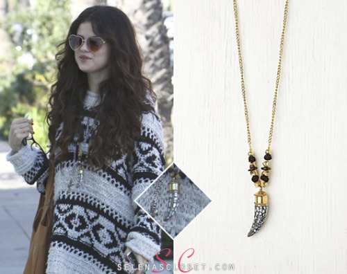 Photographers snapped Selena Gomez taking a break from the studio yesterday wearing a Free People Horn Pendant Necklace in color White. You can pick up this necklace for yourself for just $38.00. <br /> Buy it HERE <br /> She&#8217;s also wearing a Free People sweater, Fergie boots and another Free People necklace. We&#8217;re still looking for the rest of her outfit :)