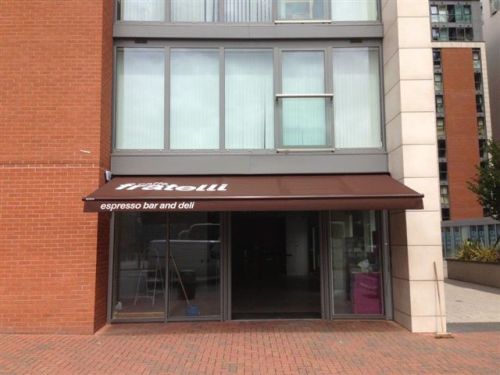 Long established client, Caffe Fratelli, with new manual folding arm awning in Docklands, July 2013. 