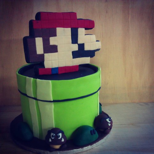 8-Bit Mario Cake with Goombas
Created by Ginger Pops