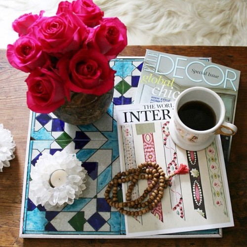 On my coffee table $5 #roses from #traderjoes, do it yourself tray from old Syrian handmade tiles, quartz crystal votive holders. I am going to read my #favorite magazines and sip a cup of coffee. That&#8217;s how I am going to start the new year:)xx #happynewyear&#160;! #diy #elledecor #theworldofinteriors #quartzcrystal #candles #malabeads #108 #newyear #decor #interiordecor # boho #bohemian #coffeetable #vignette