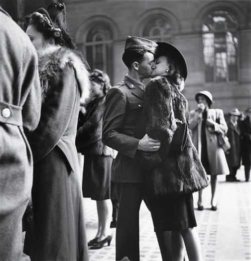 World War II soldier says goodbye (world war ii 2 soldier kiss love couple 1940s new york)