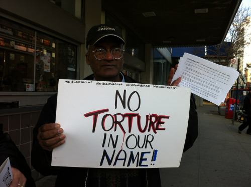 Protest sign - 'No torture in our name!!'