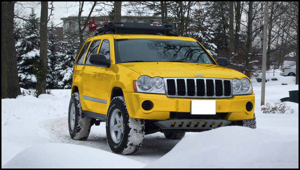 Yellow Jeep Grand Cherokee