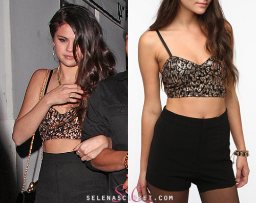 Selena Gomez enjoyed a night out with friends yesterday wearing this Motel Bernice Bra Top from Urban Outfitters. It&#8217;s currently on sale for $19.99. <br /> Buy it HERE <br /> It&#8217;s also available in Silver from Asos.com. <br /> She wore this top with a Nom De Plume skirt and Deena &amp; Ozzy bag.