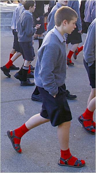 ... sandals, shorts and red socks. Sadly though this is not their uniform