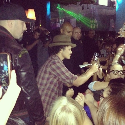 Bruno signing autographs at the after party in Zurich (x)