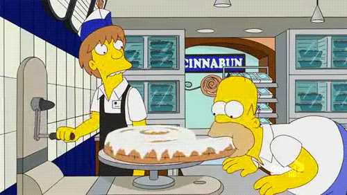 homer gets cinnabon cranked into his mouth gif