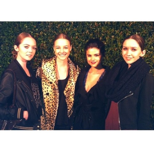 Selena Gomez, Courtney Kelsberg (far left), and other models at the Ferretti/Vogue  charity event.