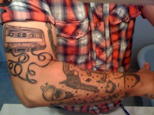 cassette tape tattoo. If the tape was spooled up,