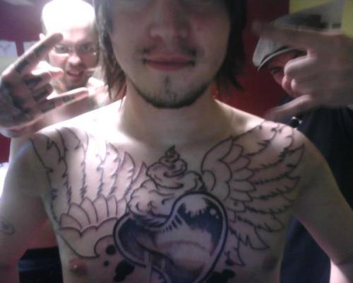 my chest piece without color the heart and smoke are colored now 