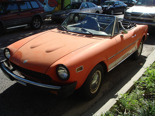 Fabulous orange 1970s fiat spyder 1800 I 8217ve seen this car floating