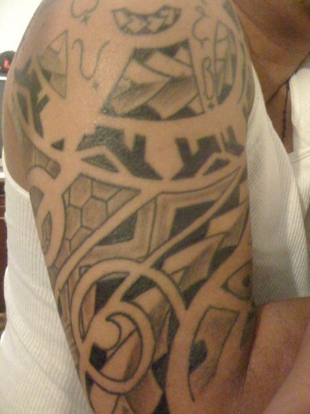 first tattoo. filipino tribal. one more session left. shoulder (partly 