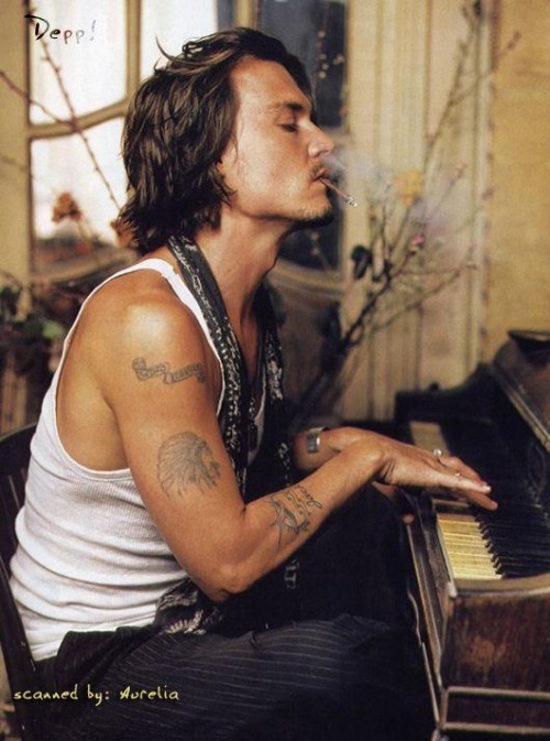 piano…cigarette…sparrow and scroll tattoos…wifebeater…long, messy hair…