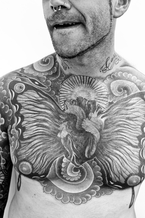 Posted May 6, 2010 at 10:07pm in tattoo chest chest piece neck arm piercing 