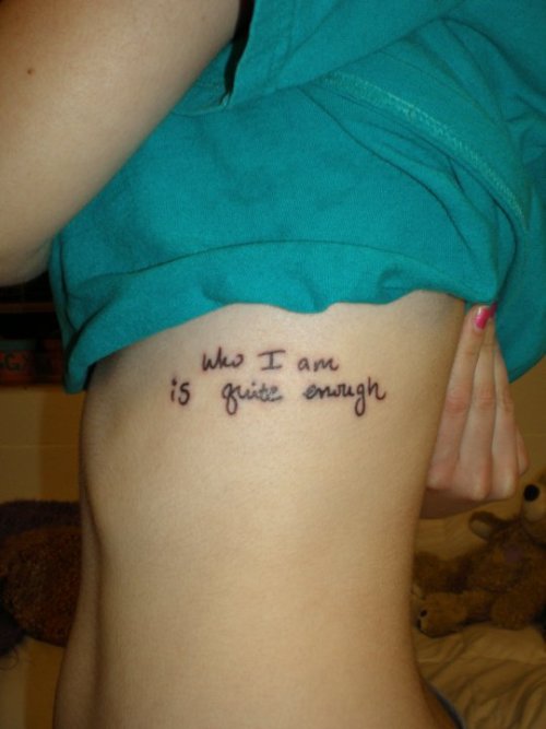 This is my first tattoo. It reads “who I am is quite enough” in my own 