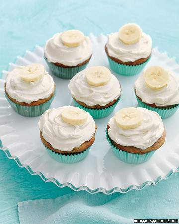 celebratewithcake:

sweettoothgirl:

Banana Cupcakes with Honey-Cinnamon Frosting
For a handheld treat that takes the cake, try these cute confections - they combine the flavor of classic banana bread with a creamy spiced frosting.
Prep: 10 minutes
Total: 40 minutes plus cooling
Ingredients: makes 12

1 1/2 cups all-purpose flour (spooned and leveled)
3/4 cup sugar
1 teaspoon baking powder
1/2 teaspoon baking soda
1/4 teaspoon salt
1/2 cup (1 stick) unsalted butter, melted
1 1/2 cups mashed bananas (about 4 ripe bananas), plus 1 whole banana for garnish (optional)
2 large eggs
1/2 teaspoon pure vanilla extract
Honey-Cinnamon Frosting

Directions:

Preheat oven to 350 degrees. Line a standered 12-cup muffin pan with paper liners. In a medium bowl, whisk together flour, sugar, baking powder, baking soda, and salt.
Make a well in center of flour mixture. In well, mix together butter, mashed bananas, eggs, and vanilla. Stir to incorporate flour mixture (do not overmix). Dividing evenly, spoon batter into muffin cups.
Bake until a toothpick inserted in center of a cupcake comes out clean, 25 to 30 minutes. Remove cupcakes from pan; cool completely on a wire rack. Spread tops with Honey-Cinnamon Frosting. Just before serving, peel and slice banana into rounds, and place one on each cupcake, if dersired. 


Website | Recommend | Submit | Ask

linda-we can do these if you dont want to do muffins!