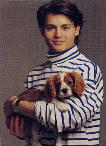 Johnny Depp a turtleneck and an orange puppy Poetry