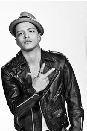 Bruno Mars !! He's so hot especially in one of his music vid 'nothin on you' 